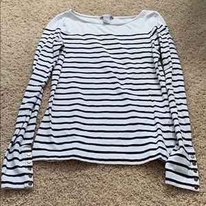White and black striped long sleeve shirt.